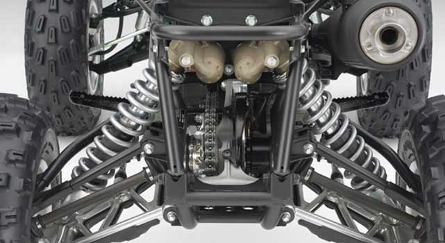 Rear end of a Honda TRX700XX with rear sprocket and chain visible.