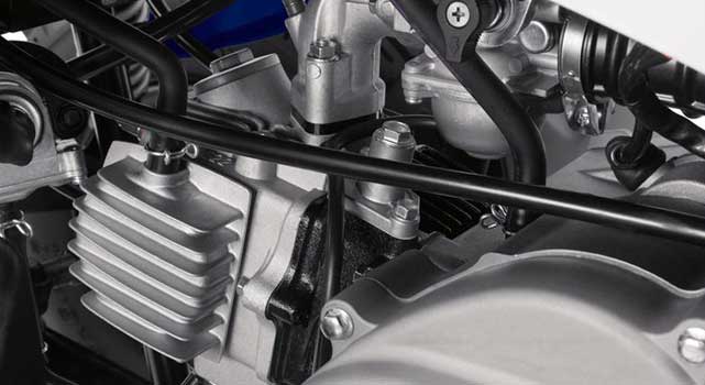 Closeup of the engine in a 2019 Yamaha YFZ50.